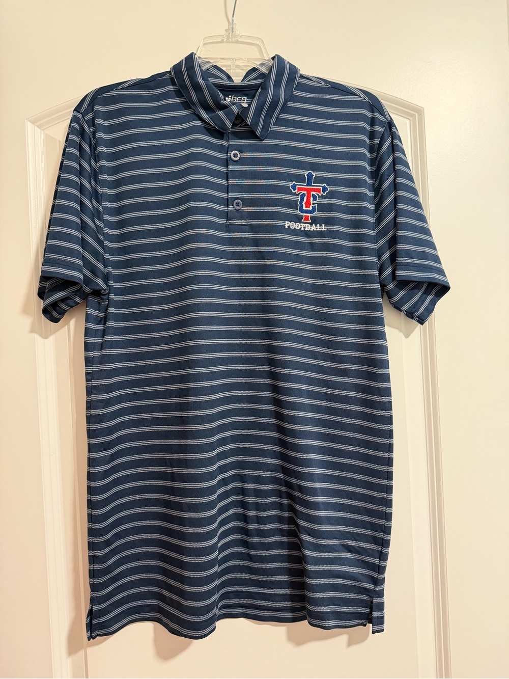 BCBG Navy and Light Blue Striped Polo with Football Crest